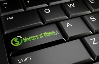 Masters of Money LLC Logo on Desktop Computer Keyboard Key Picture