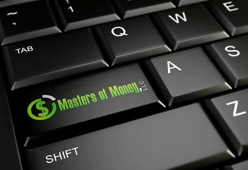 Masters of Money LLC Logo on Desktop Computer Keyboard Key Picture