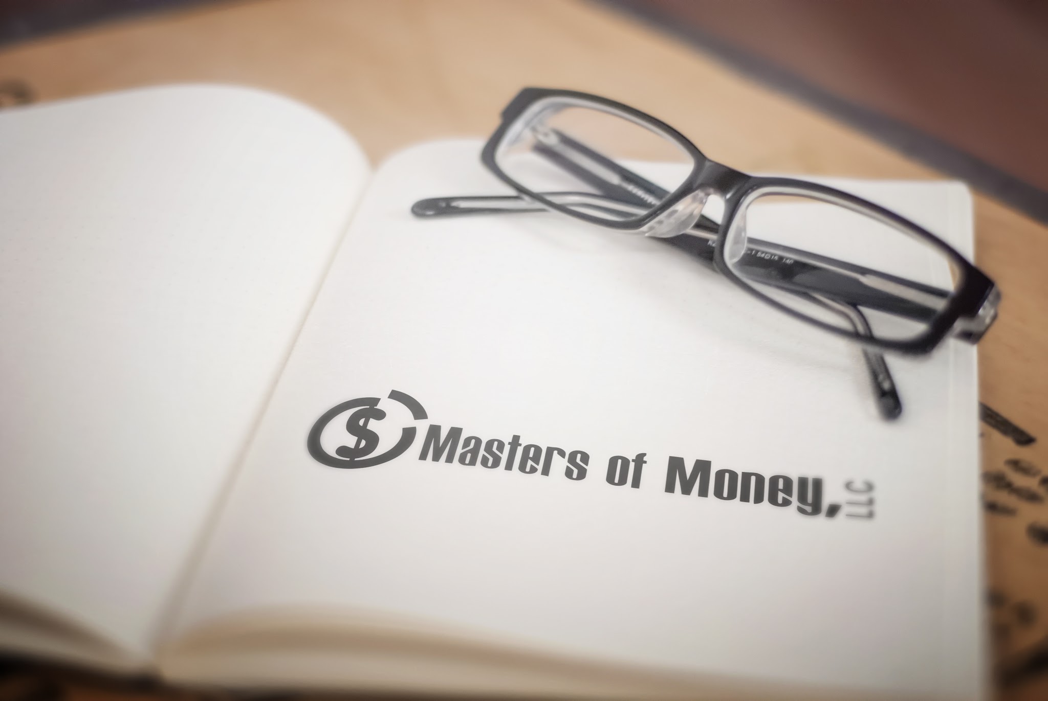 Masters of Money Book Page Logo Placement Photo