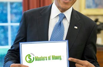 Former President Barack Obama Holding a Masters of Money Company Logo Sign Photo