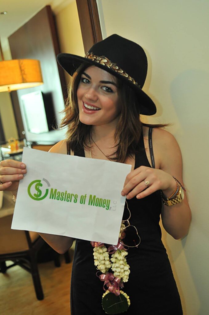 Lucy Hale Holding a Masters of Money Logo Sign Photo